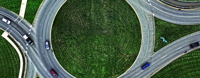 Aerial view of a traffic roundabout.