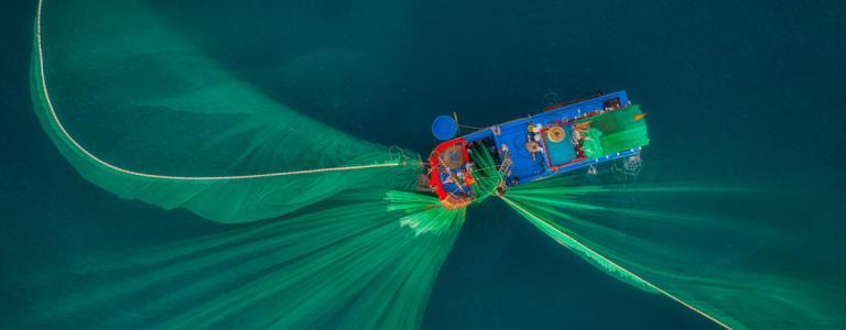 Fishing vessel on open ocean