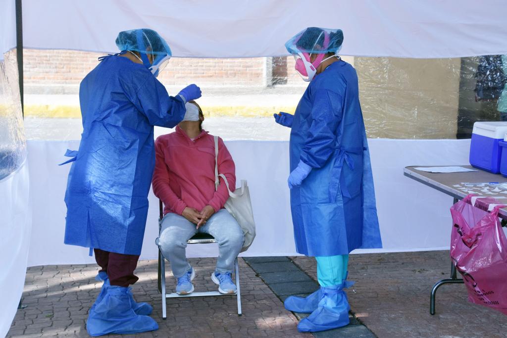 Health professionals giving COVID test in Mexico